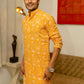 Indian men wearing yellow kurta with floral print