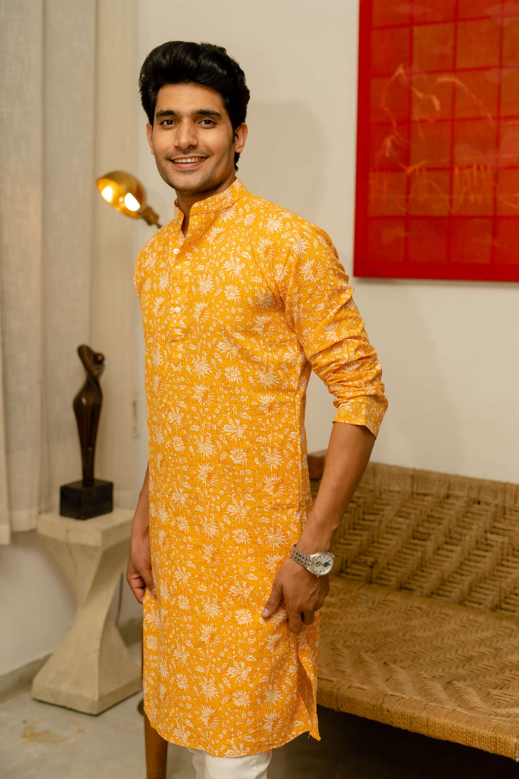 Indian men wearing yellow kurta with floral print