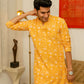 An Indian Man Wearing Yellow Kurta With Floral Print