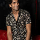 The Black And Off-White Half Sleeves Shirt With All-Over Floral Print