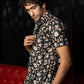 The Black And Off-White Half Sleeves Shirt With All-Over Floral Print
