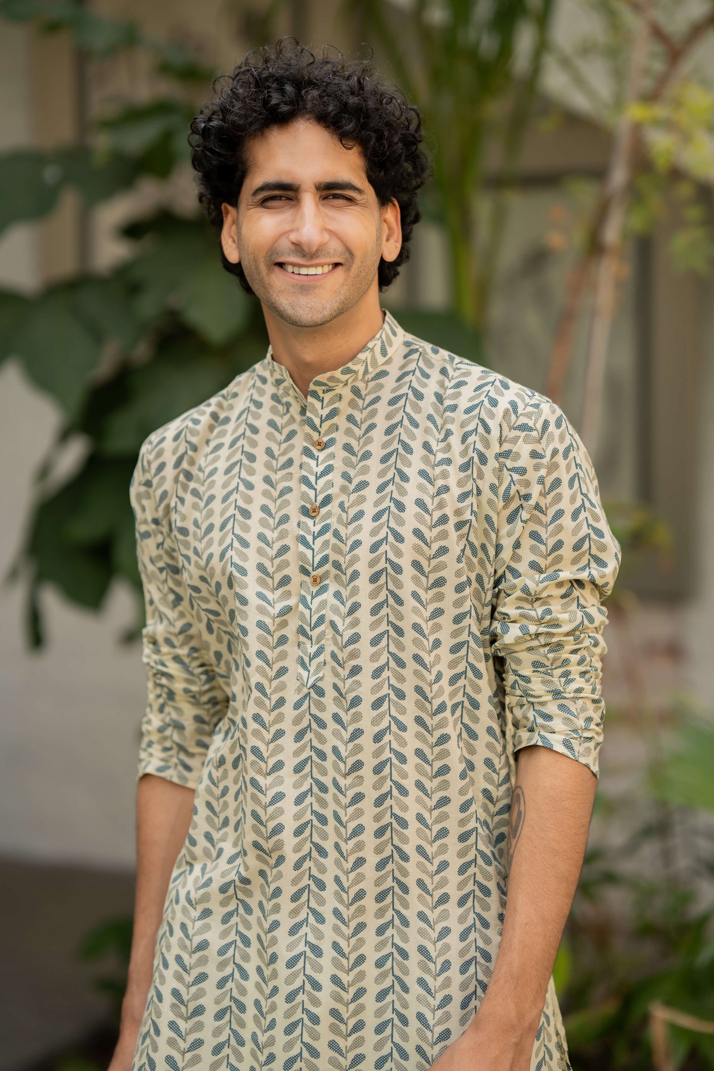 The Chalk White Color Long Kurta with Blue and Grey Petal Print