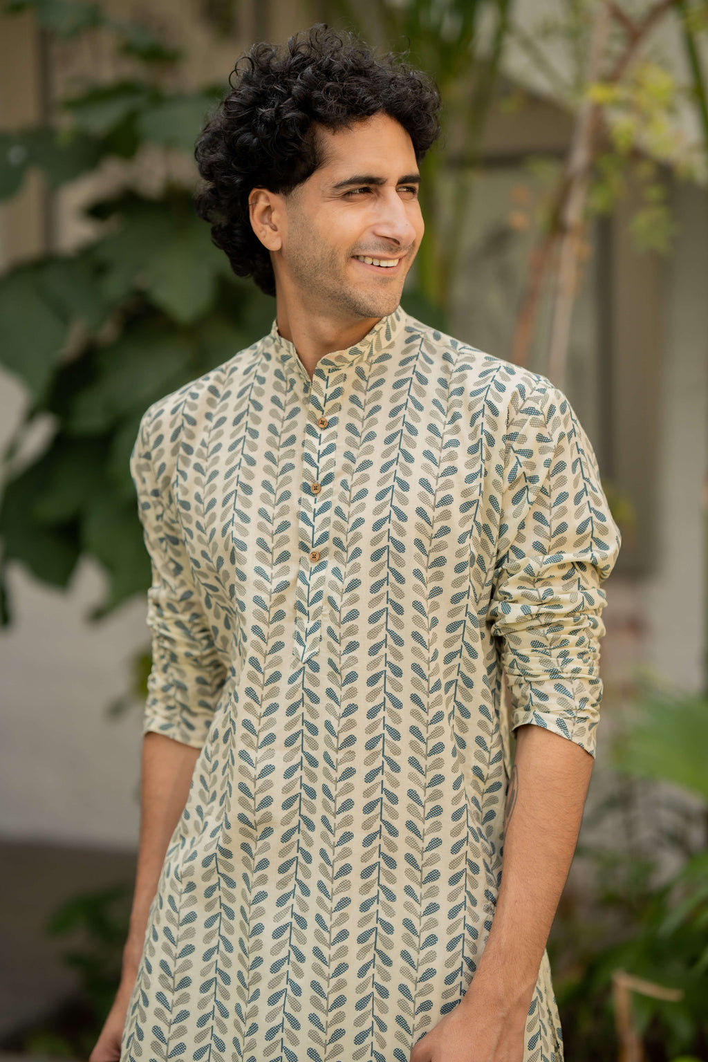 The Chalk White Color Long Kurta with Blue and Grey Petal Print