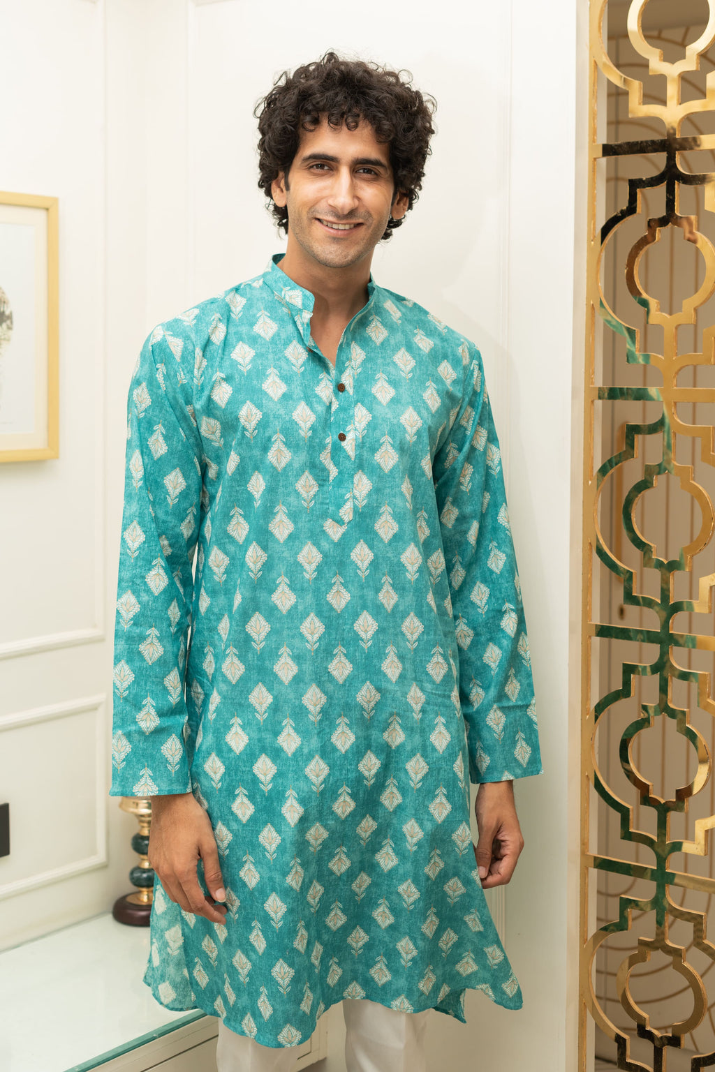 The Turquoise Color Long Kurta With Floral Foil Print