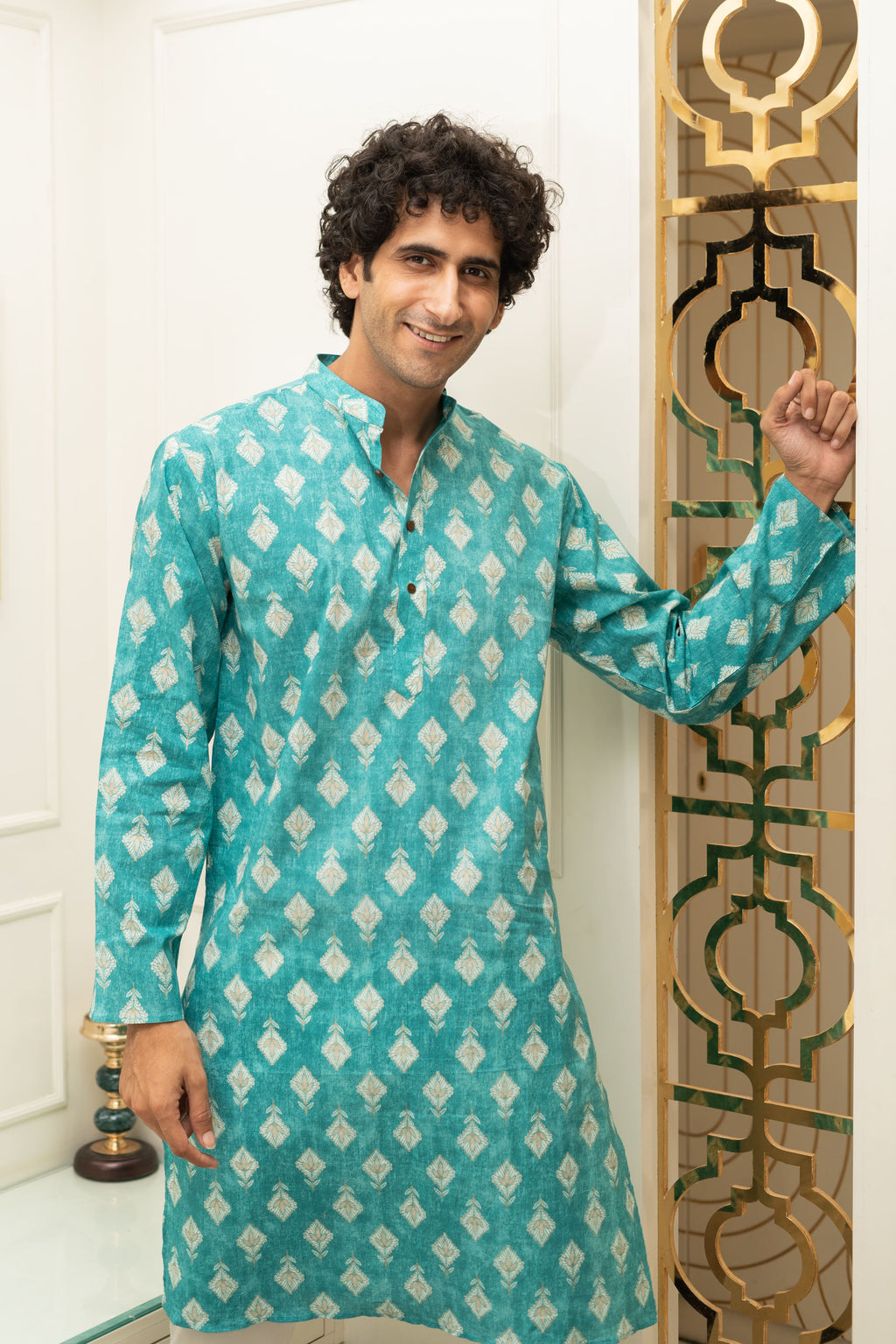 The Turquoise Color Long Kurta With Floral Foil Print