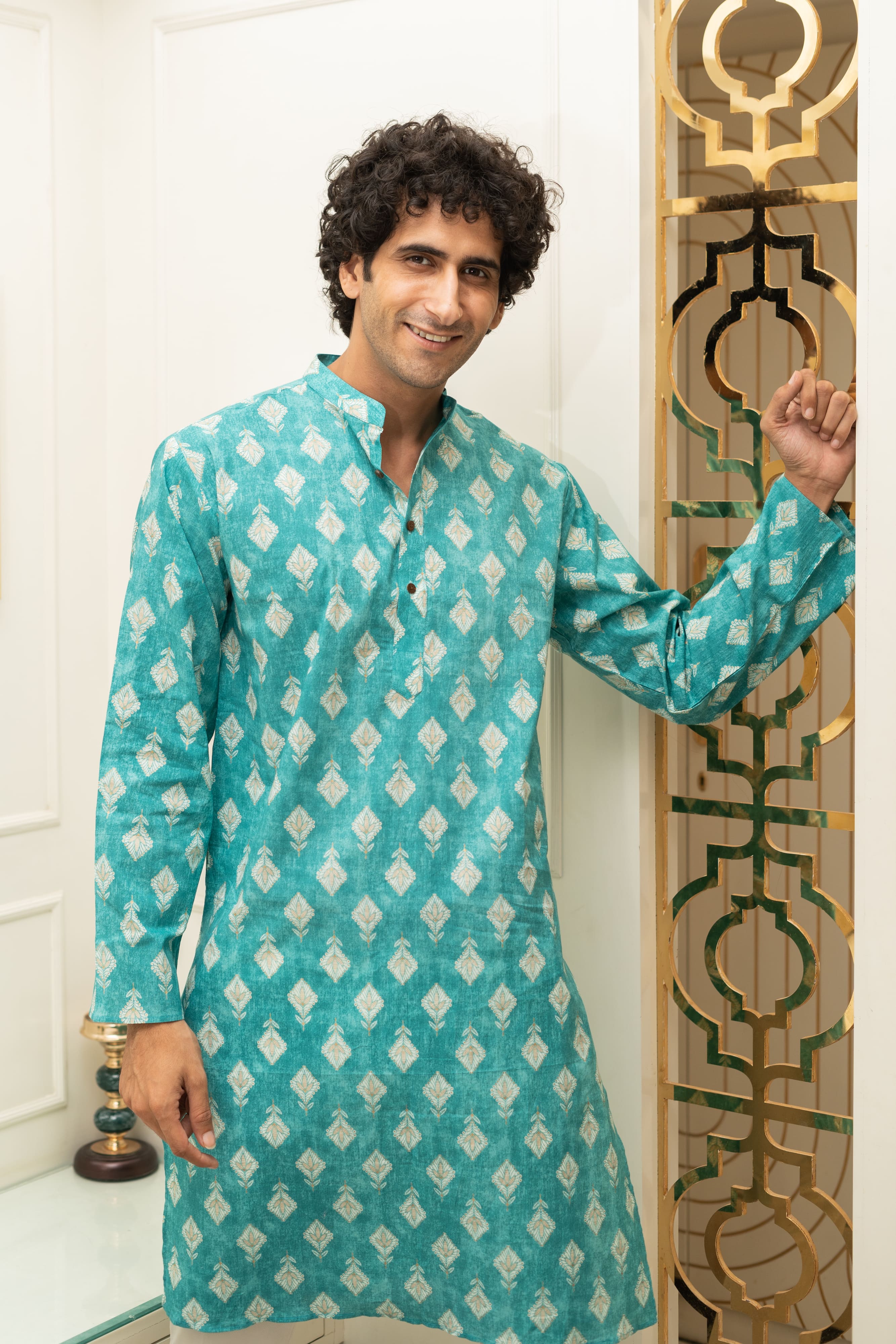 The Turquoise Color Long Kurta With Floral Foil Print