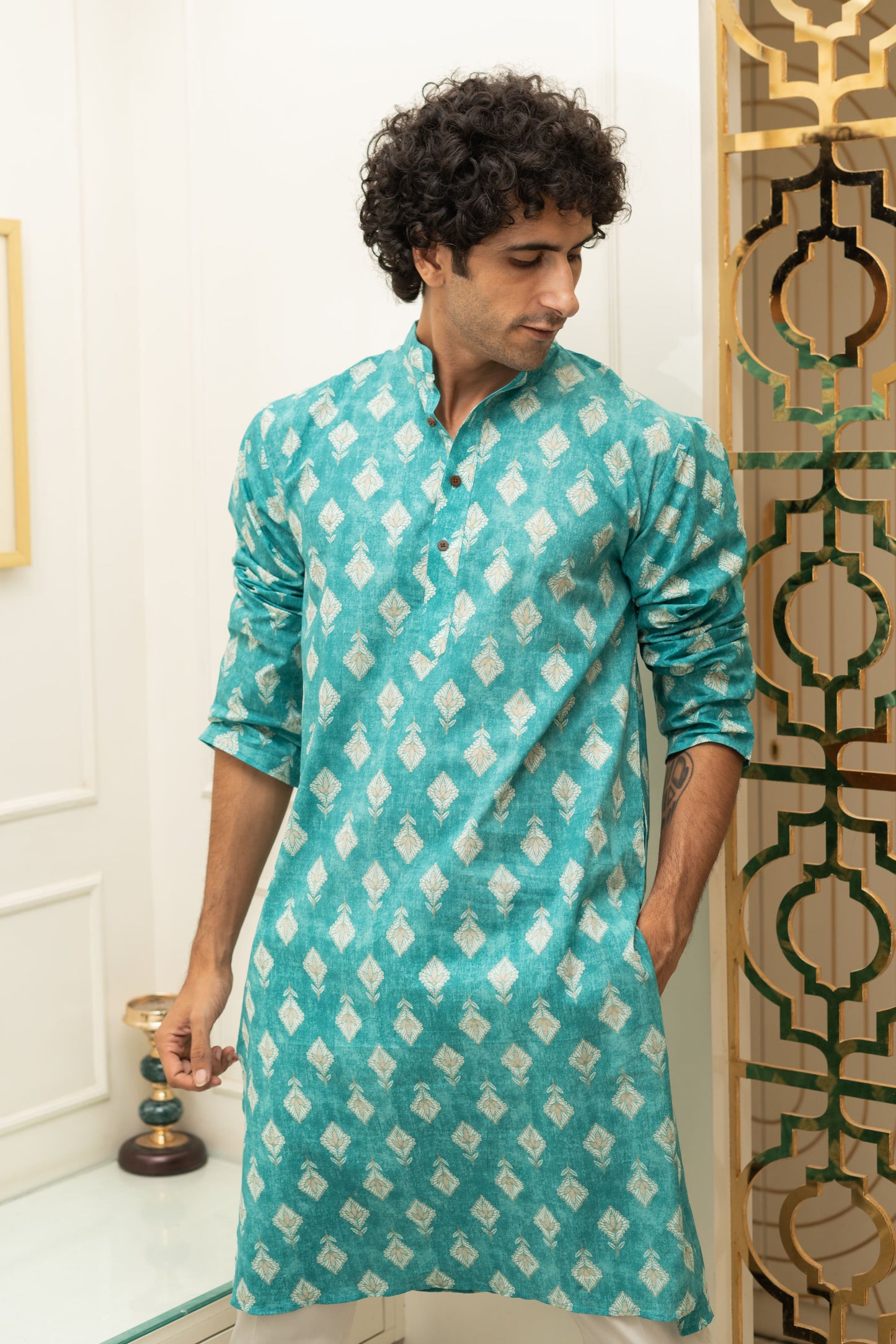 The Turquoise Color Long Kurta With Floral Foil Print