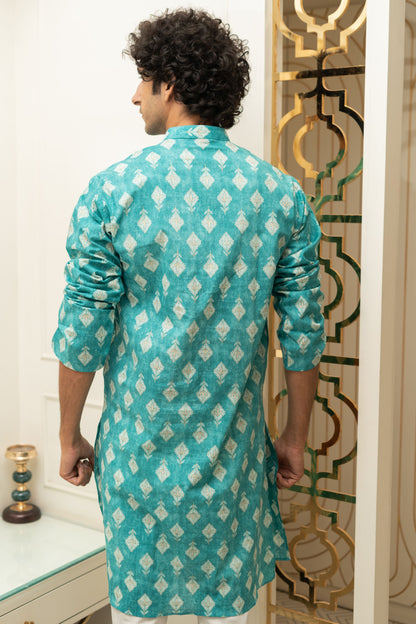 The Turquoise Color Long Kurta With Floral Foil Print