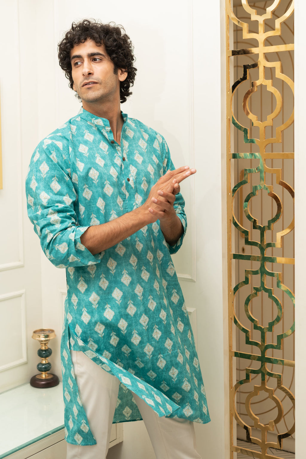 The Turquoise Color Long Kurta With Floral Foil Print