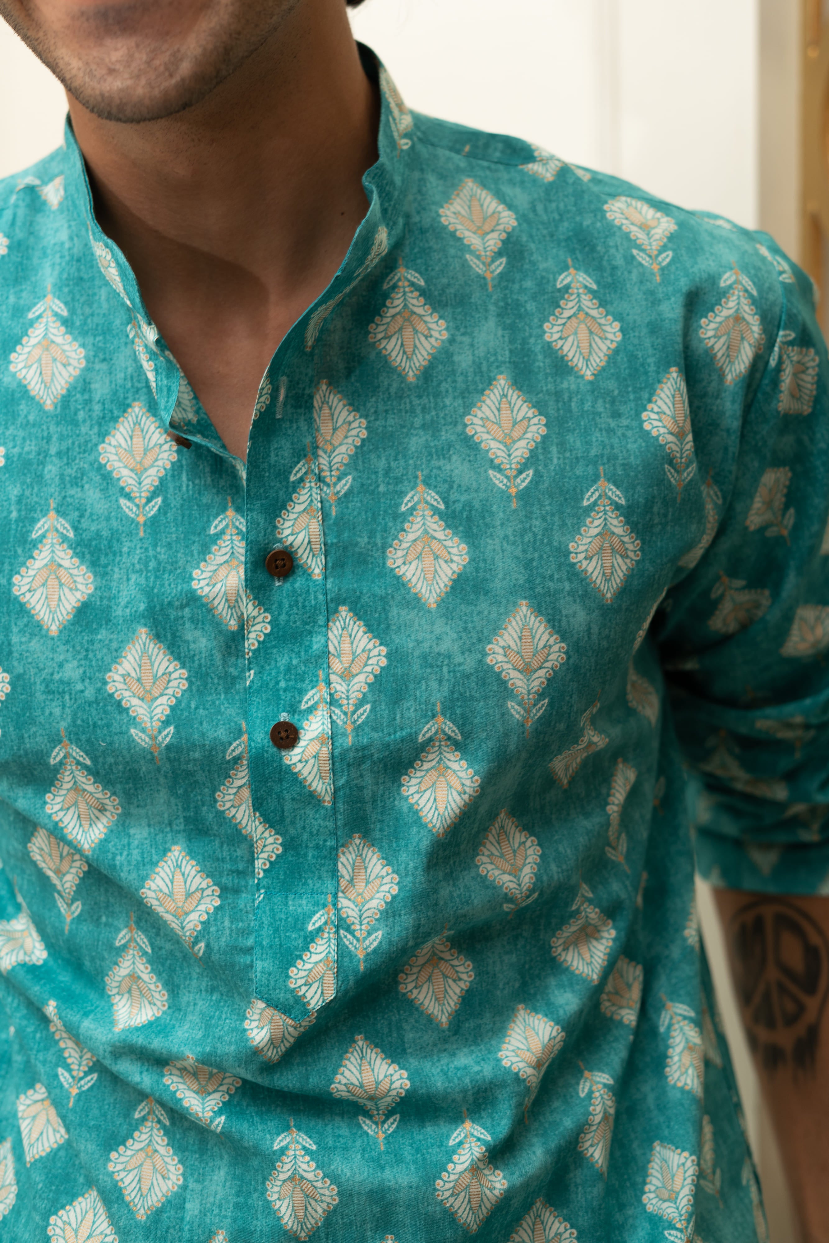 The Turquoise Color Long Kurta With Floral Foil Print