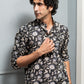 The Black And Off-White Short Kurta With All-Over Floral Print