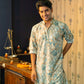 Men Wearing Off-White Floral Print Long Kurta For Diwali Shoot