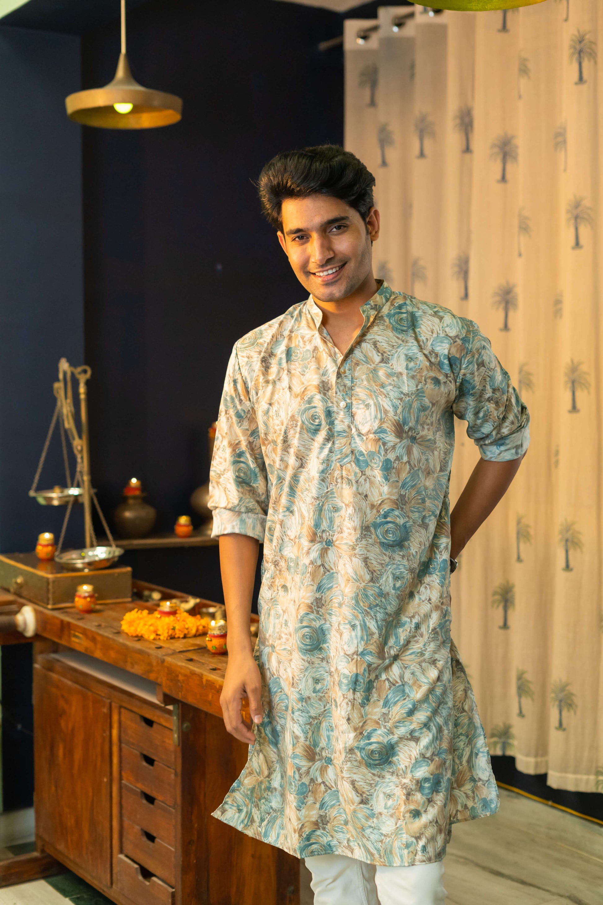 Men Wearing Off-White Floral Print Long Kurta For Diwali Shoot