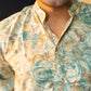 Men Wearing Off-White Floral Print Long Kurta Giving a Close-Up Look with Smile