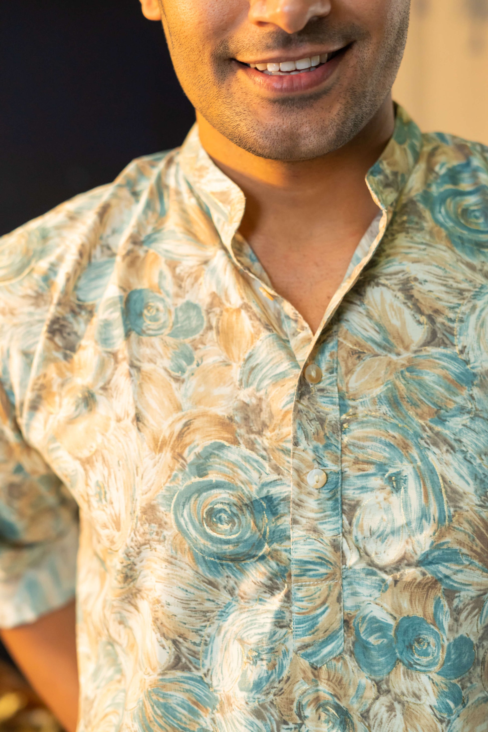 Men Wearing Off-White Floral Print Long Kurta Giving a Close-Up Look with Smile