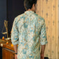 Men Wearing Off-White Floral Print Long Kurta Giving a Back Look of Kurta 
