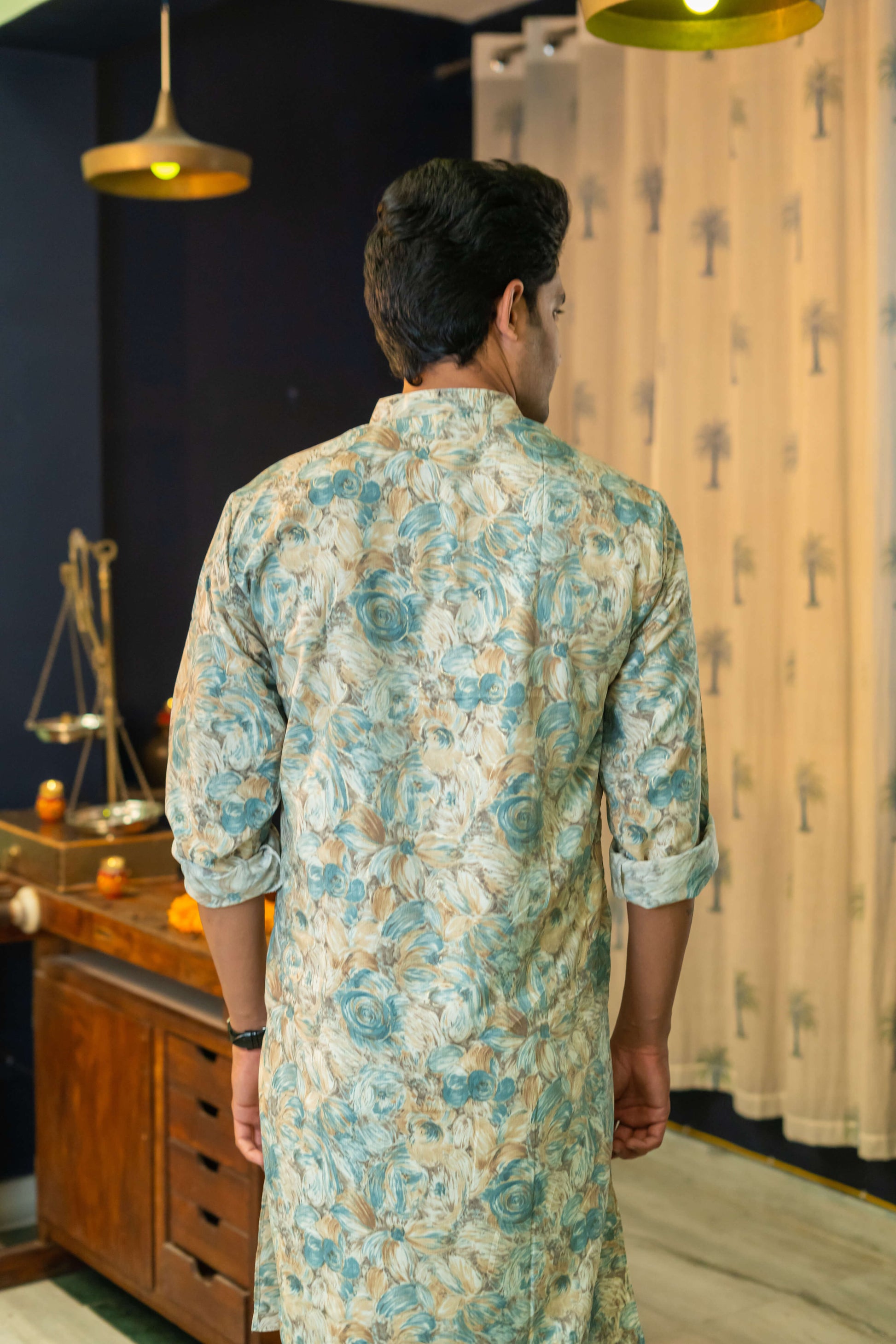 Men Wearing Off-White Floral Print Long Kurta Giving a Back Look of Kurta 