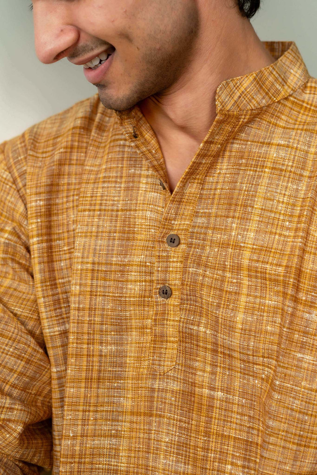 The Rustic Handwoven Short Kurta in Yellowish Orange and Light Brown Color