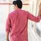 Backside view of An Indian man wearing a pink short kurta for men