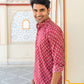 Side view of An Indian man wearing a pink short kurta for men