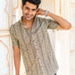 An Indian Man Wearing Olive Green Tribal Print Shirt