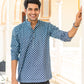 Indian man wearing navy blue short kurta