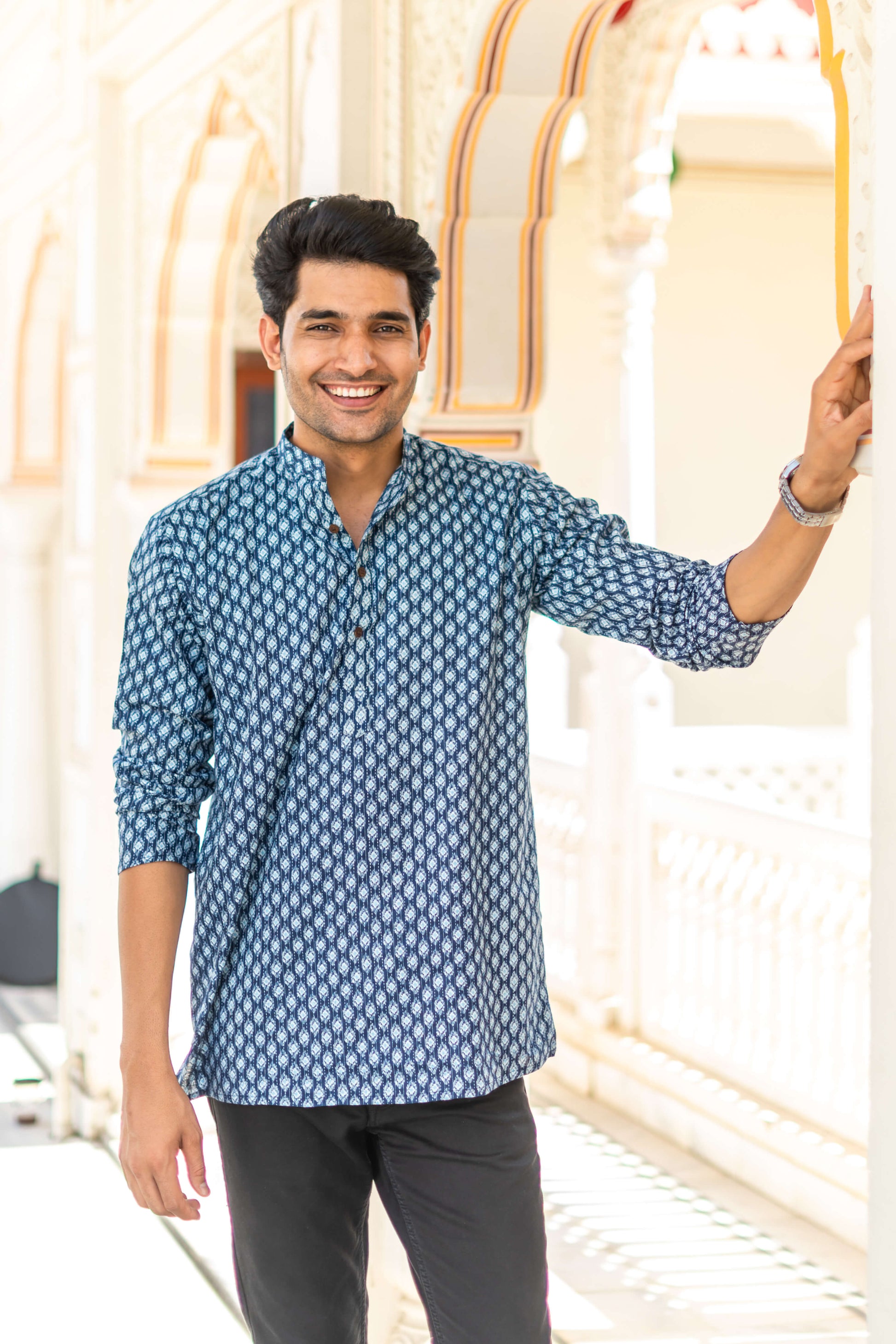 Indian man wearing navy blue short kurta