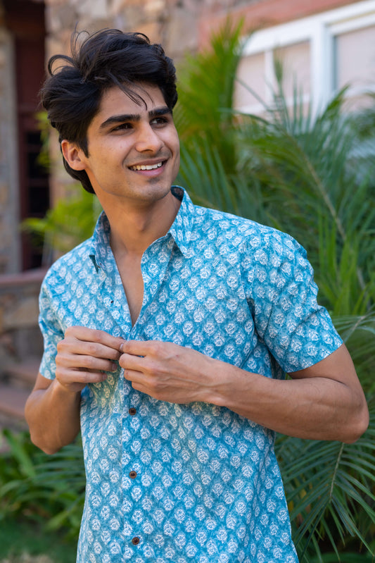 The Sky Blue Half Sleeves Shirt With Floral Butti Print