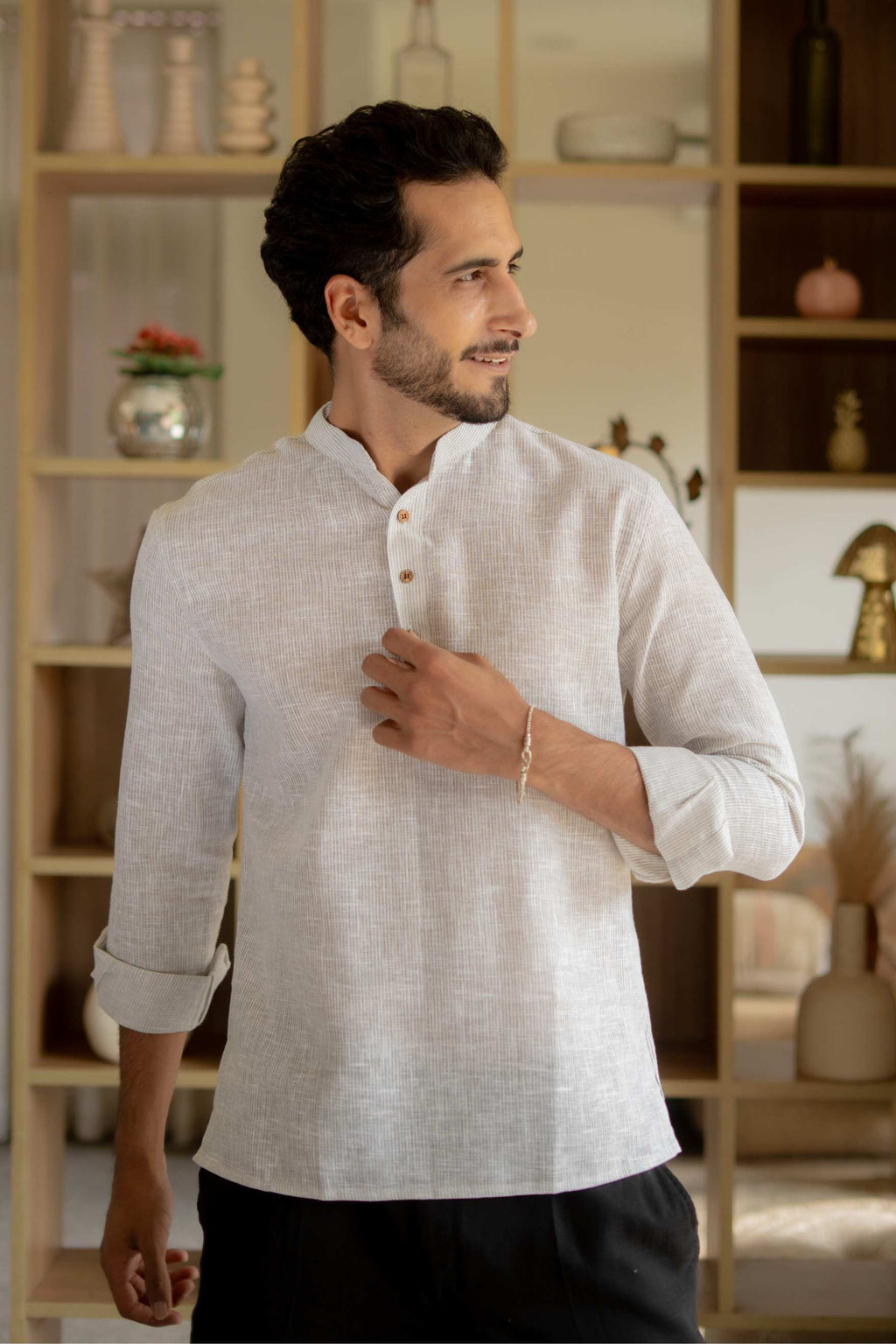 The Off White Yarn Dyed Short Kurta with Blue Weave Design
