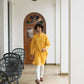 Indian man in yellow long kurta