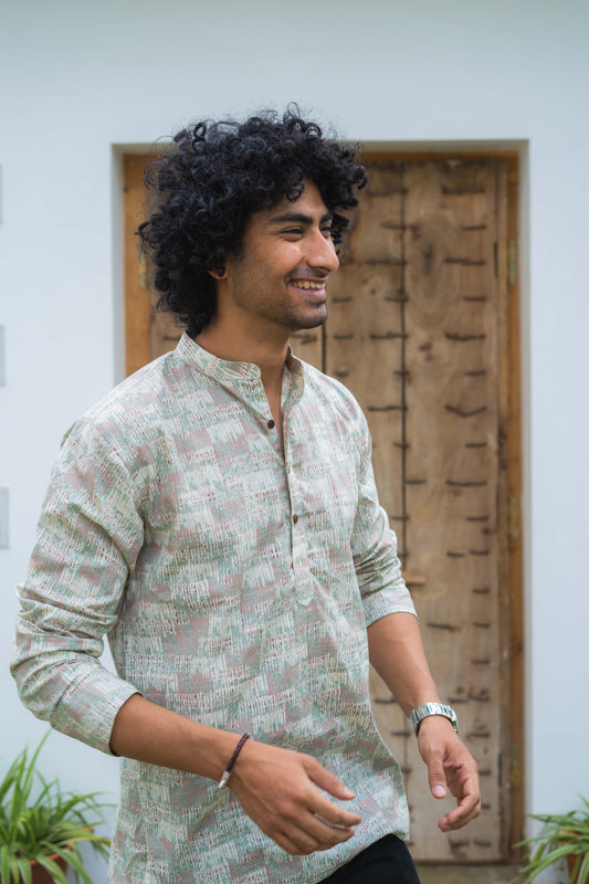 The Off-White And Yellow Short Kurta With Abstract Print