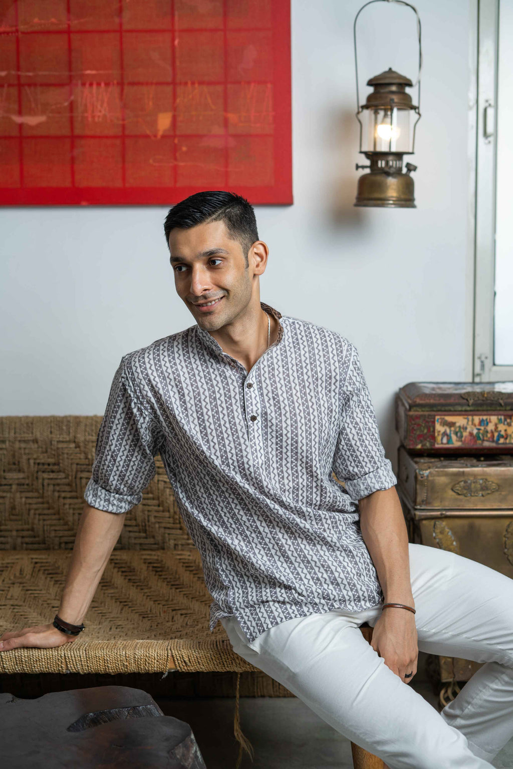 Indian men wearing a short kurta. 